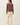 Back view of model wearing dusty mauve Ultra Soft Boatneck Basic Long Sleeve Top with cream pants
