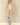 Shop Wall beige open front long sleeve cardigan with side pockets worn by a blonde model with jeans and ankle boots
