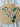 St. Patrick's Day Earrings Clover Clay Earrings Lucky displayed on a wooden surface, featuring green clover designs.