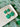 Four Leaf Clover Earrings Shamrock Earrings in green polymer clay on a white dish.