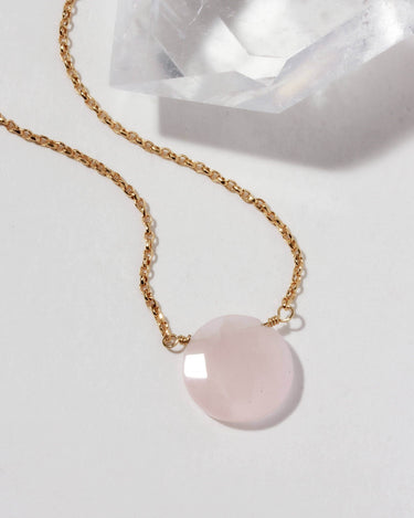 Gem in the Moon Gemstone Necklace- Rose Quartz featuring a genuine rose quartz pendant with gold chain.