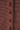 Close-up detail of brown striped knit cardigan fabric