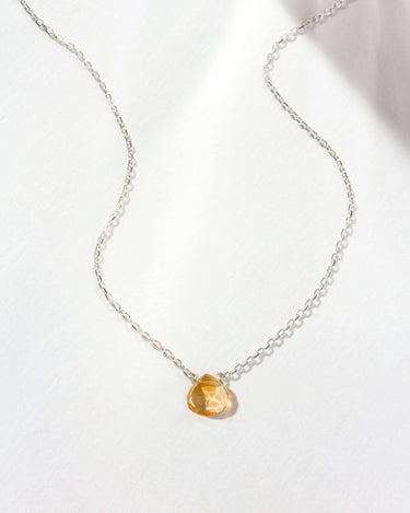 Symbolic Birthstone Necklace Sterling Silver - Citrine displayed on a light background, showcasing the unique citrine gem.
