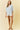 Striped Puff Sleeve Pullover Top styled with beige shorts