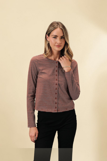 Striped Knit Cardigan long sleeve button up worn by a model against a neutral background.