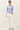 Model wearing light blue Ultra Soft Boatneck Basic Long Sleeve Top