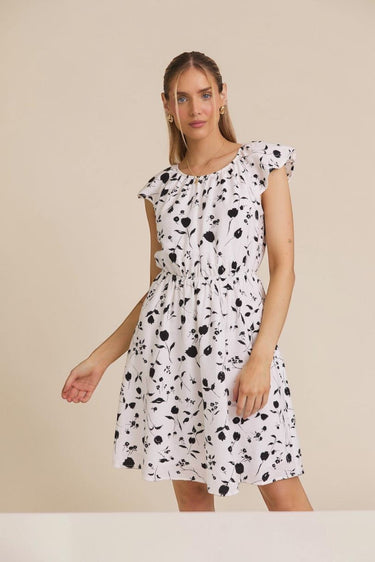 ROUND NECK RUFFLE SHORT SLEEVE FLORAL PRINT DRESS worn by model who is 5'10" and wearing size small