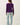 Back view of model wearing purple Ultra Soft Boatneck Basic Long Sleeve Top with blue jeans