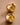 18K Gold Plated Waterproof Stainless Steel Hoop Earrings 7463 displayed as a pair on a warm brown background