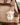Felt Mini Sheep Keychain hanging from a stylish backpack, showcasing its cute design and handmade quality.