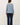 Back view of blue raglan sleeve slub pullover sweater on model