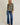 Full-length view of model wearing olive green Round Neck 3-4 Sleeve Top with blue jeans