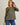 Model wearing olive green Round Neck 3-4 Sleeve Top with blue jeans