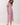 Pink Tropical Print Puff Sleeve Midi Dress on a model with puff sleeves and a V-neckline, featuring a tropical leaf design.
