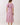 Back view of the Pink Tropical Print Puff Sleeve Midi Dress with puff sleeves and smocked bodice.