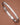 Tarnish-Resistant Waterproof Stainless Steel Bangle 7040 displayed diagonally on a brown background