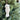 Snowy Owl Felt Wool Christmas Ornament displayed on greenery