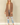 Shop Wall brown open front cardigan with long sleeves and side pockets worn by a blonde model with ripped jeans