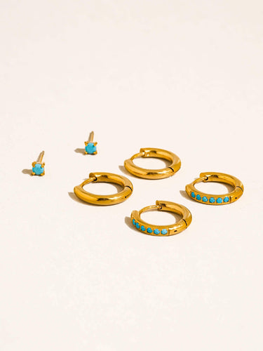 Ivalo 18K Gold Non-Tarnish Turquoise Huggie Earring Set displayed with turquoise stones and gold hoops.