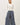 Full-length view of model wearing white Ultra Soft Essential Basic Crewneck Button Up Cardigan