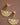 18K Gold PVD Plated Waterproof Stainless Steel Drop Earrings 7527 displayed vertically on a neutral background