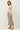 Ribbed Button Up Cardigan side view with patterned skirt