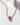 Prism Gems Birthstone Necklace - February featuring an amethyst stone on a gold and pastel chain.