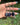 Blue Goldstone Crystal Keychain featuring polished deep blue sparkling gemstones displayed in a hand