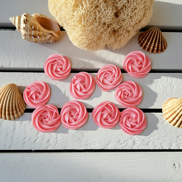 Rose Swirl Travel Soap pink rose-shaped soaps arranged on a tray