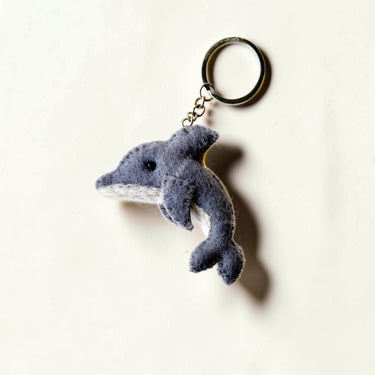 Shop Wall handmade grey dolphin felt wool keychain with a metal ring, perfect for backpacks or purses.