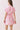Back view of model wearing Floral Print Elastic Waist A Line Mini Dress with pink floral design and short sleeves.