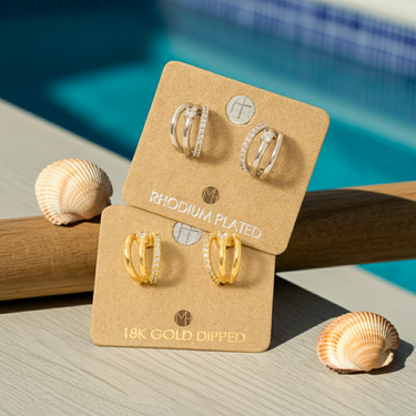 Pave Layered Hoop Huggie Earrings set on display, featuring Rhodium Plated and 18K Gold Dipped options.