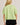Back view of model wearing green short sleeve sweater cardigan