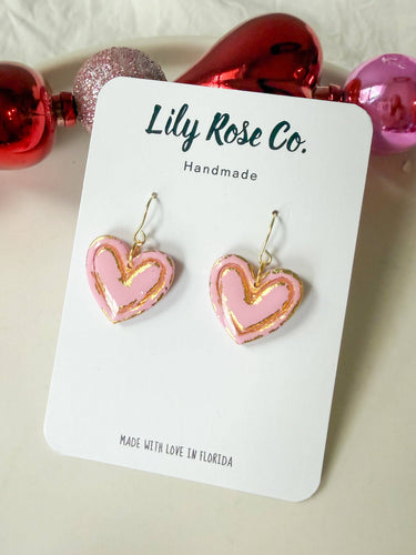 Hearts with Gold and Silver Foil Earrings displayed on a card, featuring pink heart designs with gold accents.