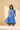 Kaidy Tropical Loly Trapeze Mini Dress featuring a blue patterned design and ruffle trim split neckline.