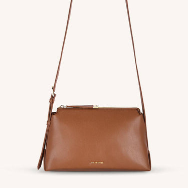 Mira & Moss Audrey Crossbody Bag in brown vegan leather with adjustable strap and gold-tone hardware.