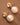 18K Gold PVD Plated Waterproof Stainless Steel Drop Earrings 7774 displayed as a pair on a brown background