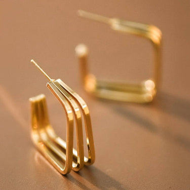 18K Gold Plated Waterproof Stainless Steel Hoop Earrings 7101 close-up showing the geometric gold design