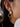 Model wearing Anémone 18K Gold Non-Tarnish Pearl Drop Earrings