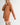Side view of model wearing Elianna rust wide collar cardigan with shorts