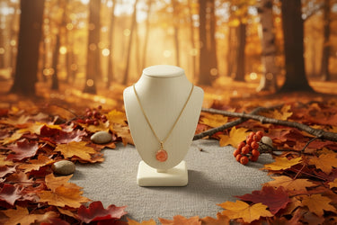 Sublime Adjustable Necklace- Sunstone with a genuine sunstone pendant on a gold-plated chain against a pastel background.