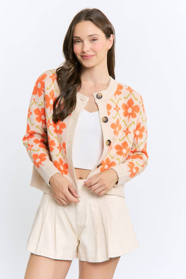 Model wearing CW10437D floral button up cardigan, full length view