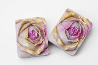 Purple Rose Gold Handmade Soap with rose design and gold highlights on a white background.