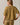 Back view of model wearing mustard yellow short sleeve sweater cardigan