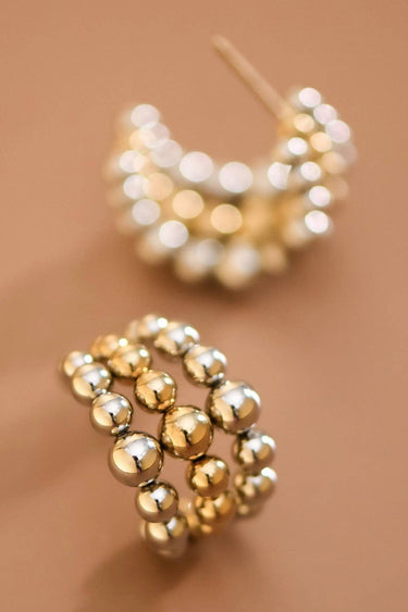 18K Gold Plated Waterproof Stainless Steel Hoop Earrings 7850 angled product view highlighting the decorative details