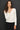 Model wearing white Ultra Soft Boatneck Basic Long Sleeve Top