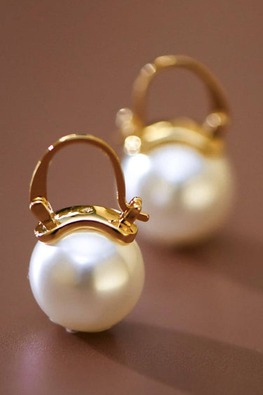 18K Gold PVD Plated Stainless Steel Pearl Drop Earrings 8036 displayed vertically on a brown background