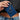 Adriana Card Holder Navy held in a woman's hand with a gold keychain detail, showcasing its chic design.