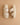 The Polly Cream Ruffle Strap Raffia Platform Slide Sandal with double ruffle straps and braided sole on a neutral surface.
