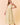 Maxi Dress with Side Pocket and Adjustable Strap in beige front view